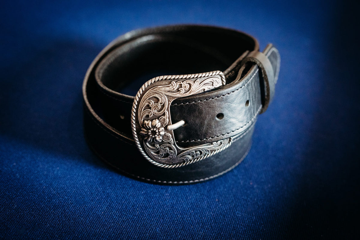 Sterling black full grain leather belt with black stitching, angled view