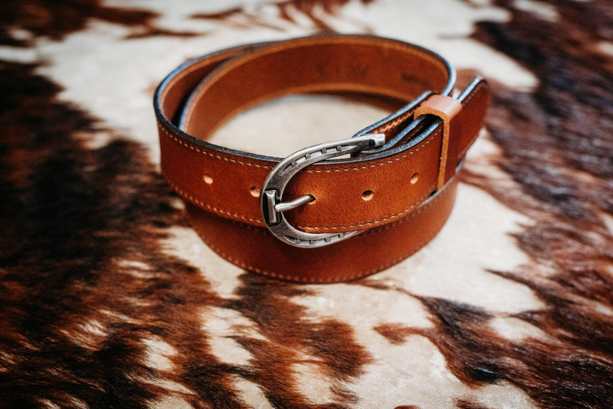 The Shoe golden brown water buffalo belt showing billet, keeper and horseshoe buckle