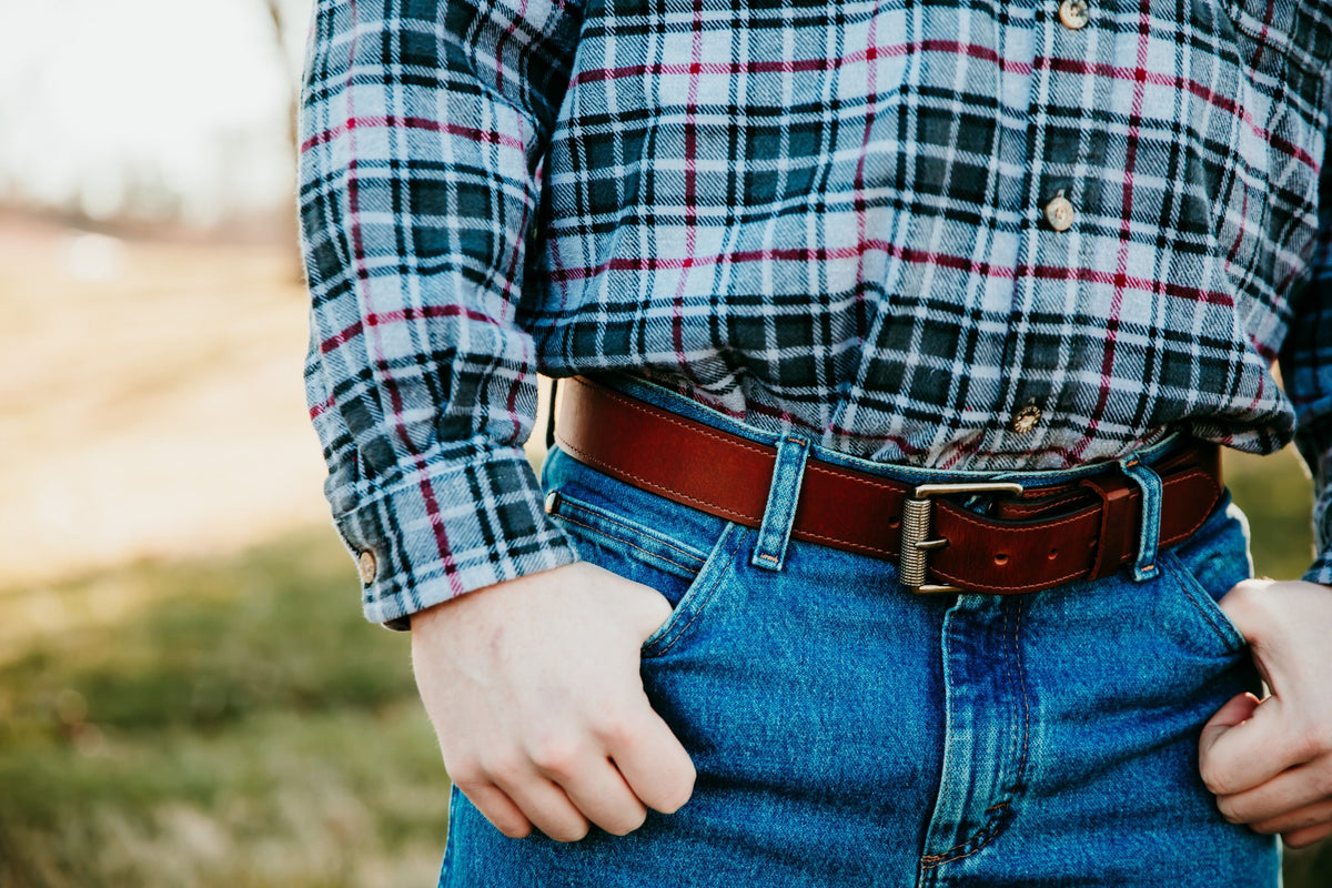 Man wearing the Cooper full grain leather belt with jeans
