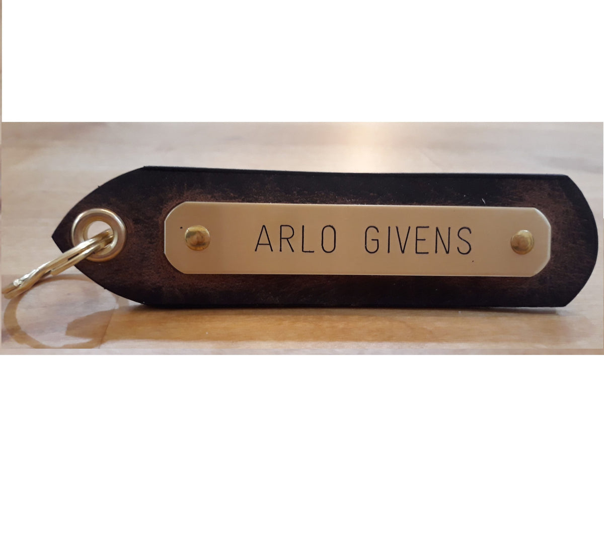 1-1/4 inch nameplate keytag in brown leather with engraved brass plate
