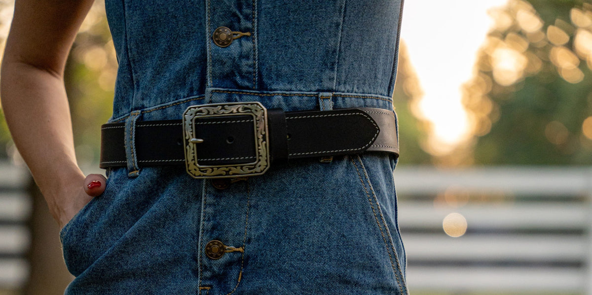 Austin full grain leather belt worn with denim, ornate buckle