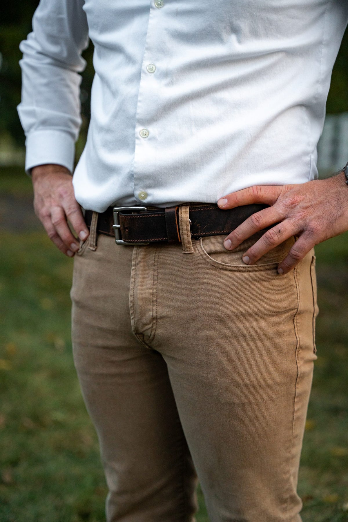 Man wearing Timothy distressed leather belt with khakis