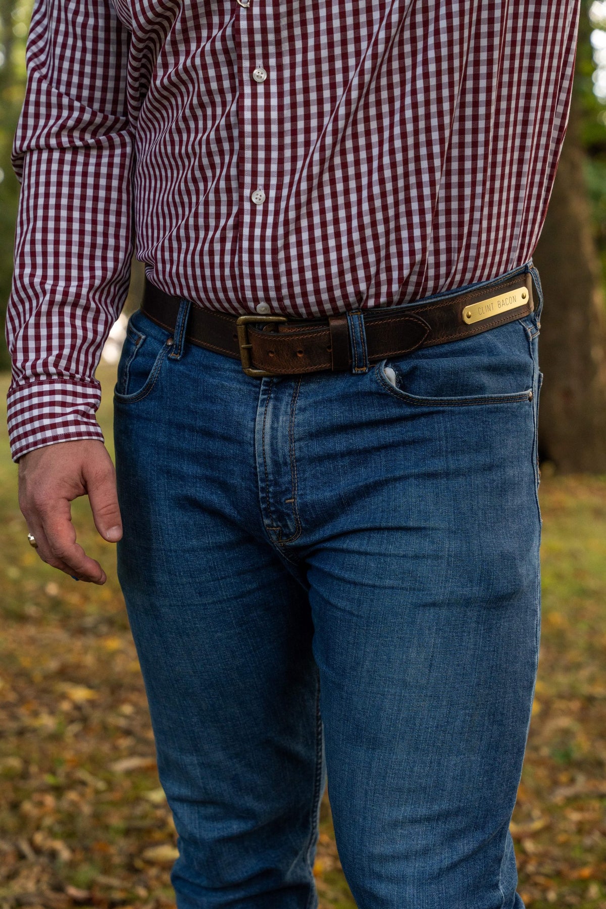 Man wearing Work Belt nameplate belt in water buffalo leather with jeans
