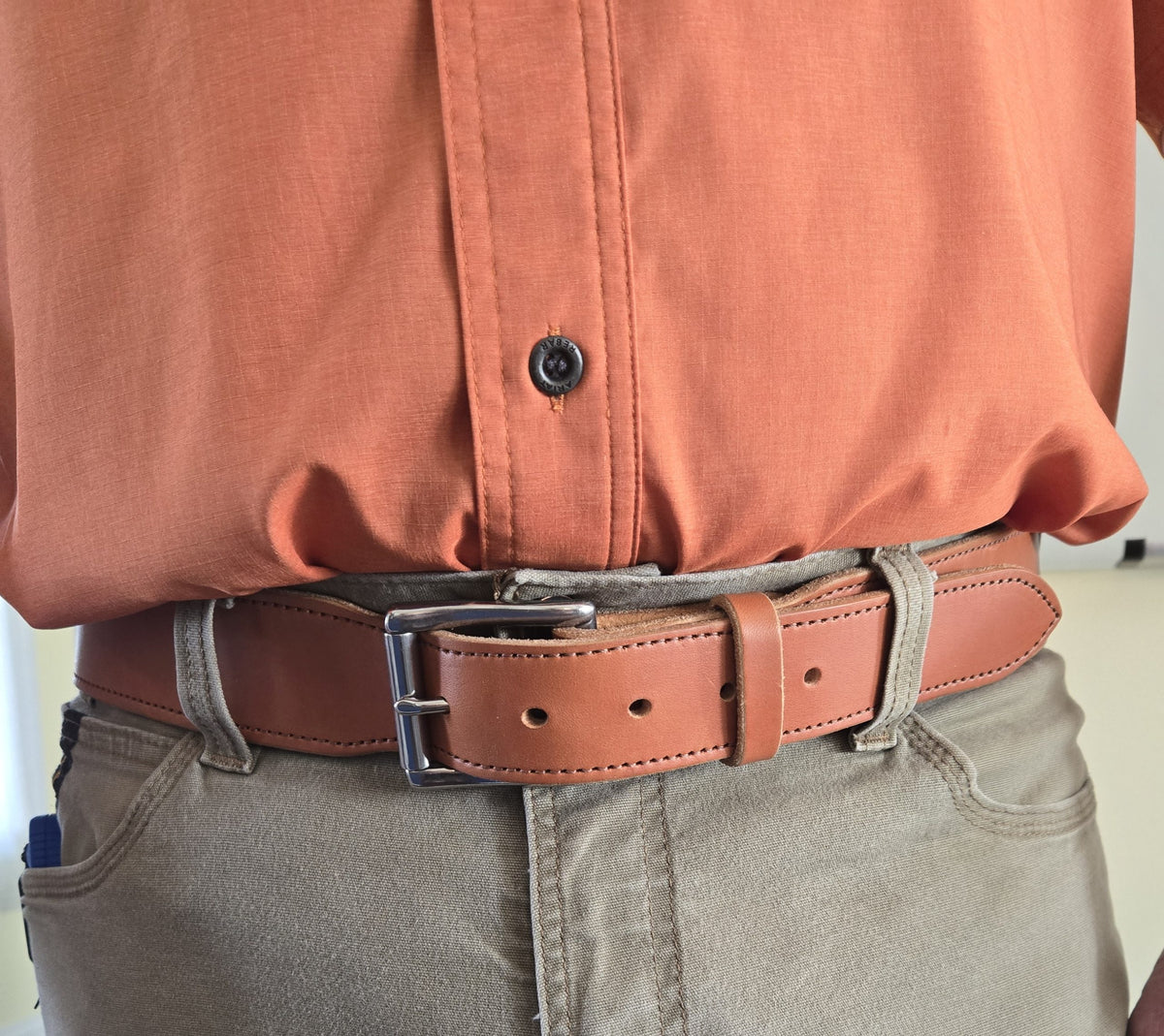 The Duke bridle leather CCW belt worn with khakis, buckle detail