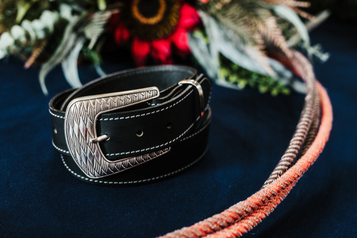 Clint full grain leather belt in black with ornate silver buckle
