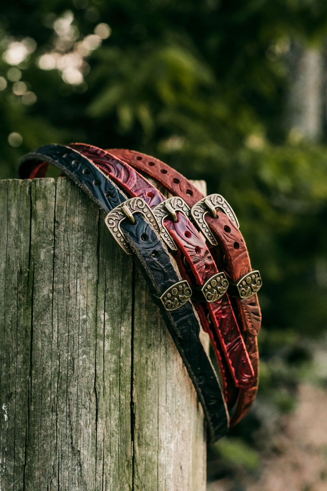 HB02 embossed full grain leather hat bands with antique brass buckles, three colorways