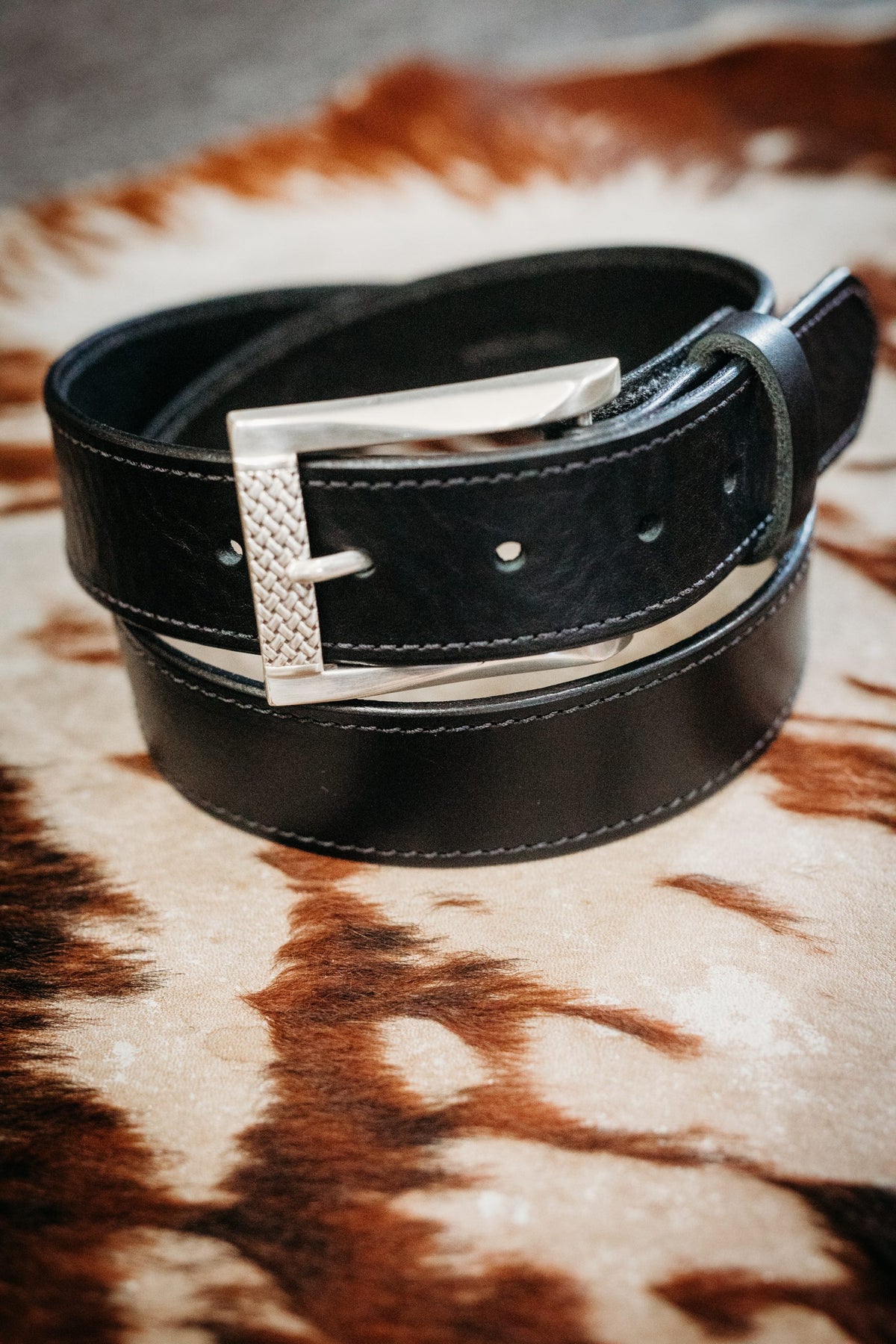 Cash black full-grain leather belt with polished silver basket-weave buckle