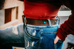 Ella water buffalo belt with turquoise spots, worn with jeans