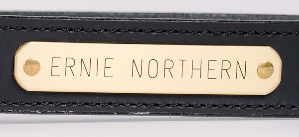 Engraved brass nameplate on black water buffalo leather belt