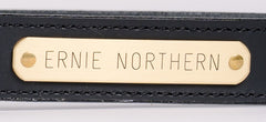 Engraved brass nameplate on black water buffalo leather belt