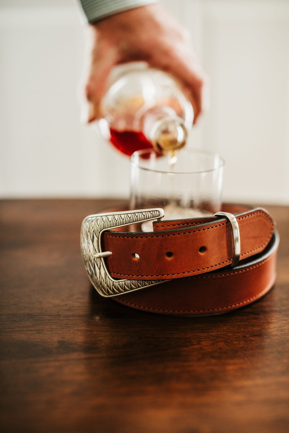 Harlen bridle leather belt in chestnut with ornate silver and black buckle