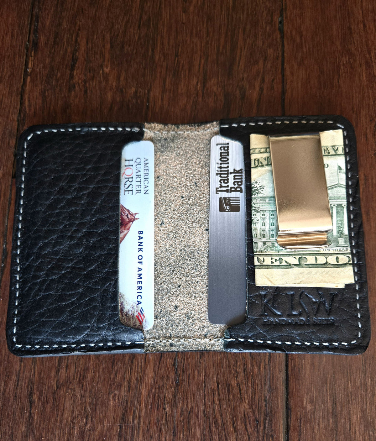 Monogrammed black bridle leather front pocket wallet open with money clip