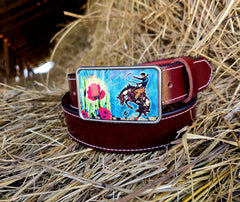 Bucking Bronc buckle detail on crimson water buffalo leather belt