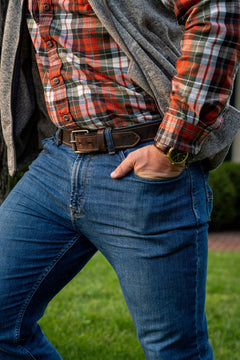 Man wearing Wallace water buffalo belt with antique silver roller buckle