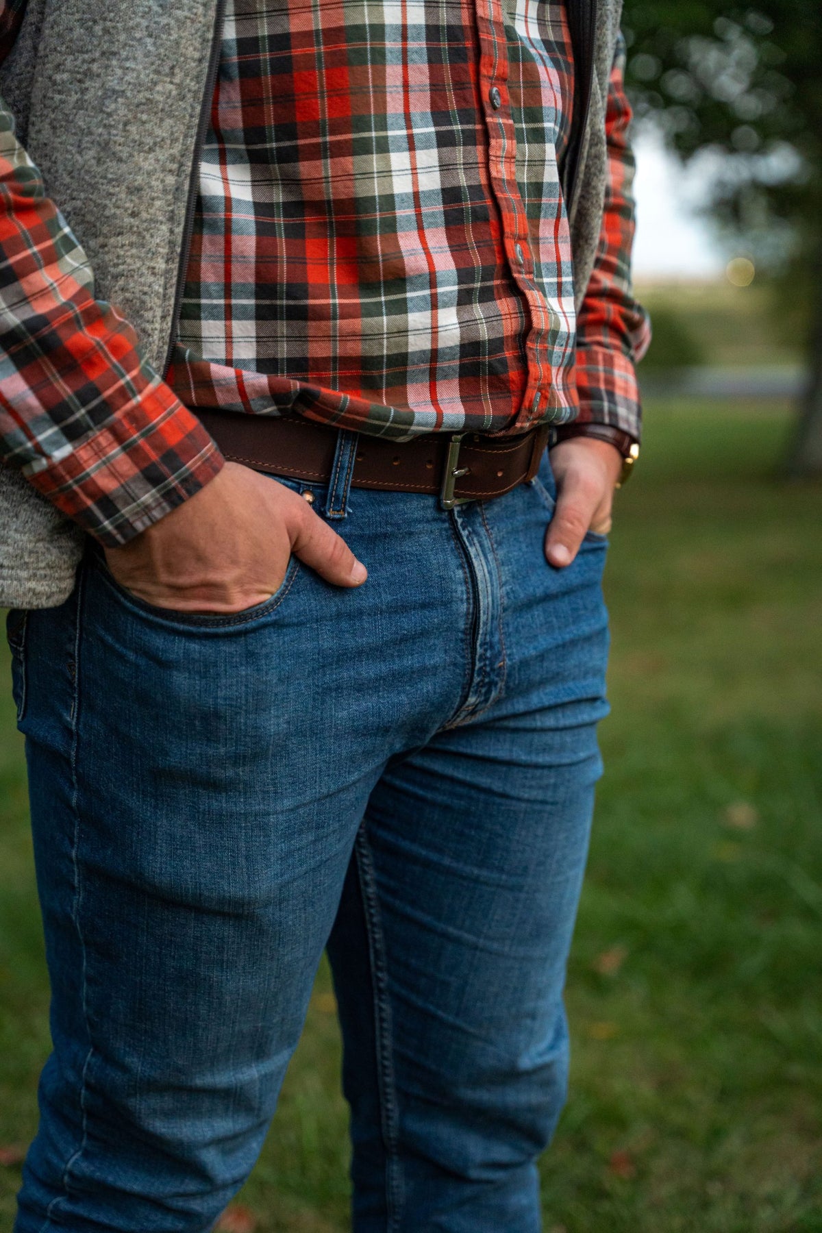Man wearing Taylor chocolate water buffalo belt with jeans