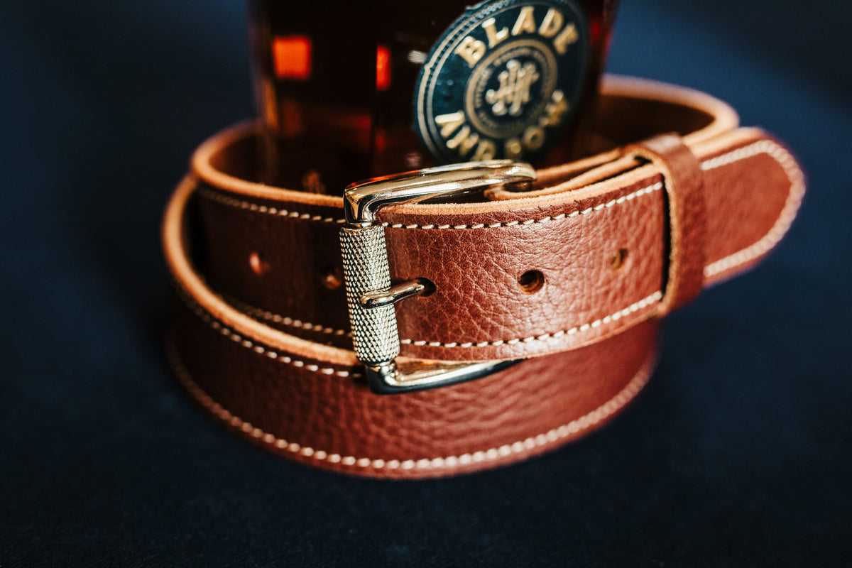 The Friday bridle leather belt in brown with engraved stainless roller buckle