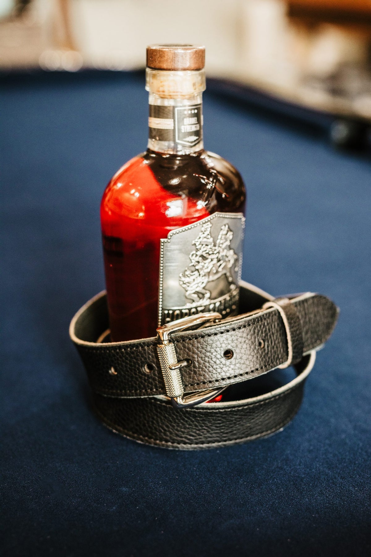 The Sunday harness leather belt in black with polished stainless roller buckle