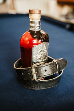 The Sunday harness leather belt in black with polished stainless roller buckle