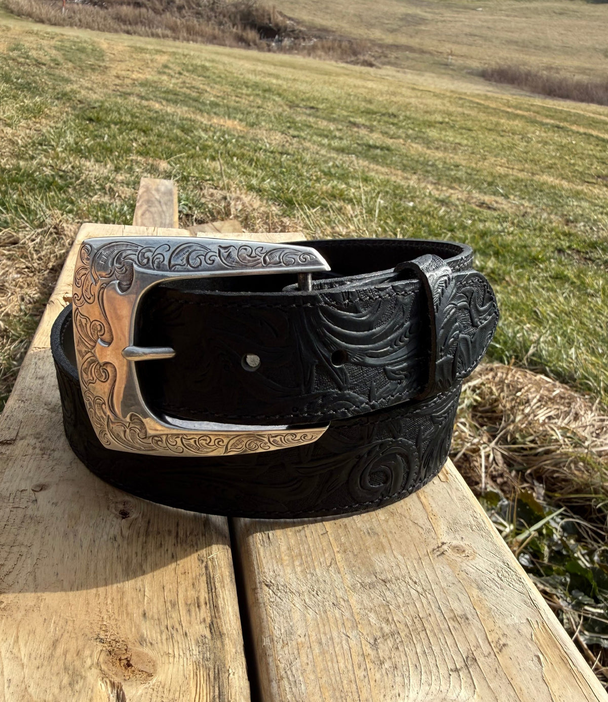 Wilson embossed water buffalo leather belt, floral tooling and silver buckle detail