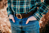 Man wearing Kayce chocolate water buffalo belt with solid brass buckle