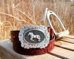 The Bridle Rose burgundy embossed water buffalo belt with silver horse buckle