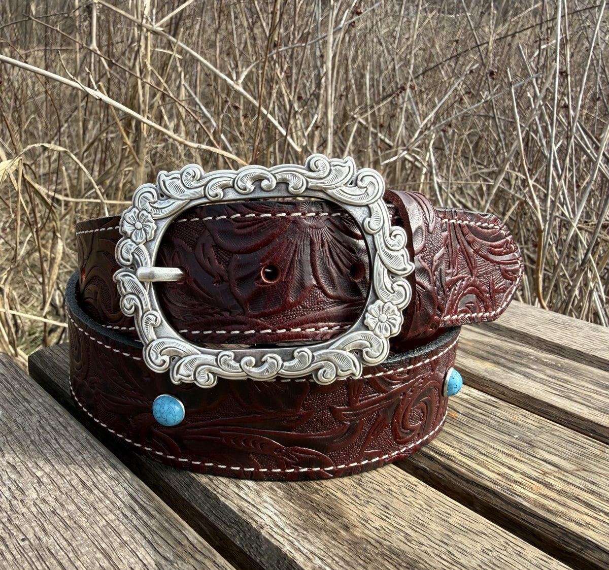 Georgia burgundy embossed water buffalo leather belt with silver floral buckle