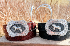 The Bridle Rose embossed leather belt in burgundy and black colorways