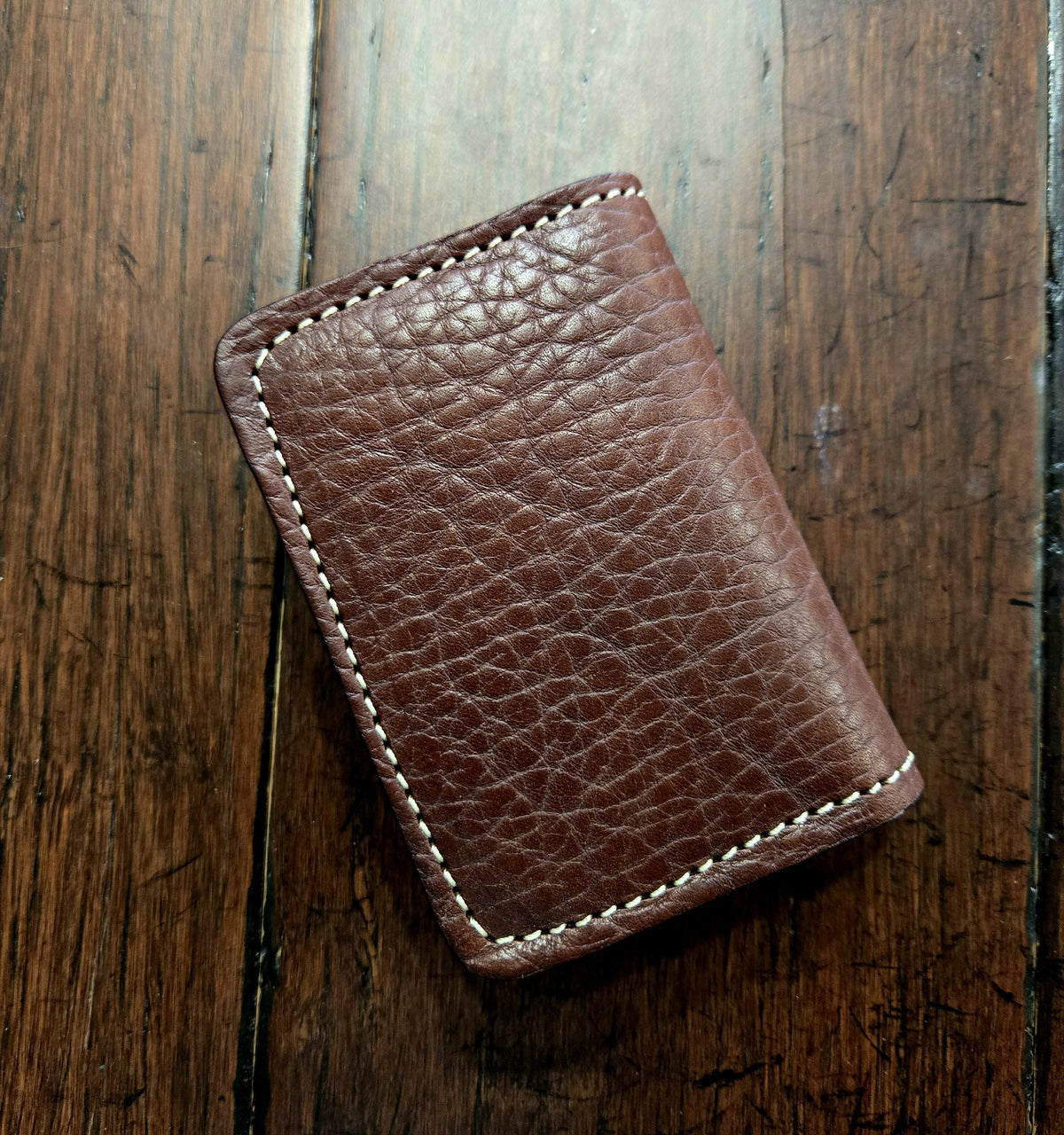 Walnut bridle leather front pocket wallet, milled bison-look grain