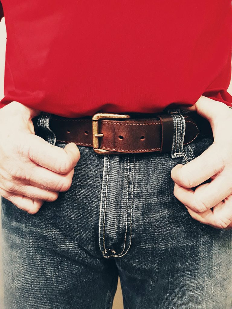 Man wearing a handcrafted leather belt