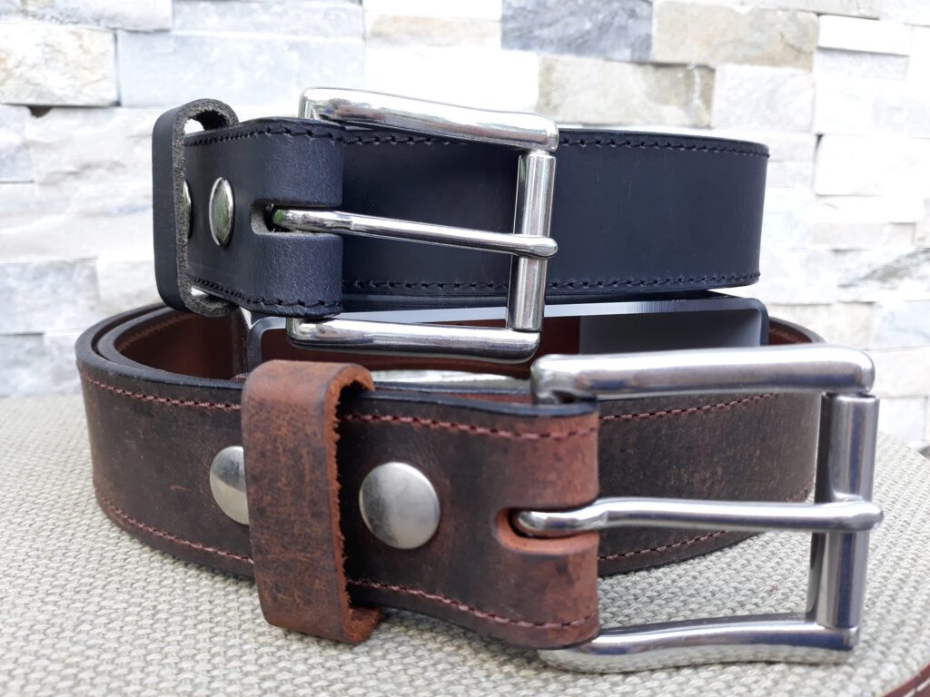 Finished leather belts with metal buckles